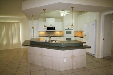 Your guests can pull up a stool while you whip up