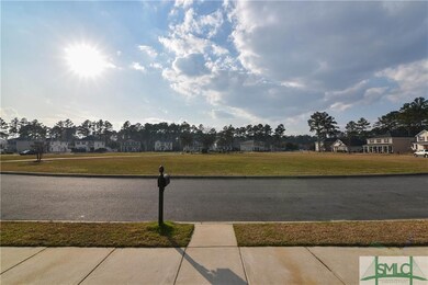View from lower front porch.  Large green space!