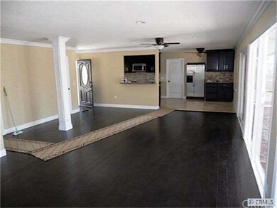 Great room w/dark walnut hardwood flooring,recesse