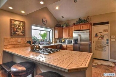 Remodeled Kitchen Open to the Dining Area and Livi