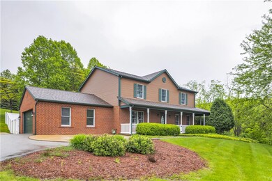 4 BR Home with Large 2 Car Attached Garage and Wra
