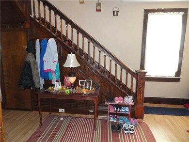 Entry/Foyer. Open staircase with beautiful wood wo