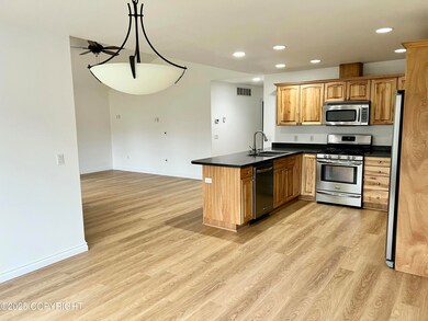 Unit A dining, kitchen, living