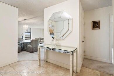 03-Unit 611 Foyer 1B