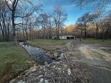 View of street featuring driveway