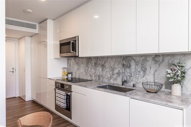 Bosche appliance, marble countertops.