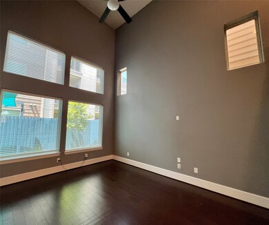 Large family room with double height ceilings and