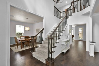 FRONT ENTRY WITH ACCESS TO DINING ROOM, STUDY, AND