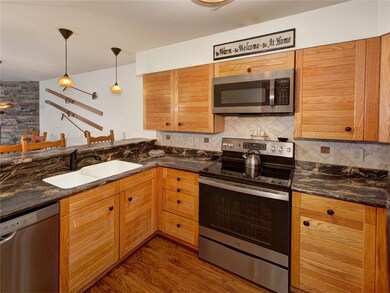 Updated kitchen featuring new appliances and solid