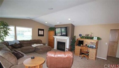Large family room, vaulted ceilings and cozy firep