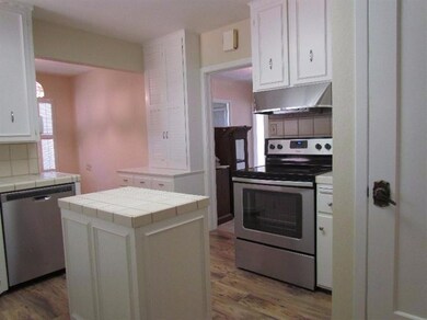 Brand new stainless steel appliances in this kitchen with lots of cabinets and pantry space...