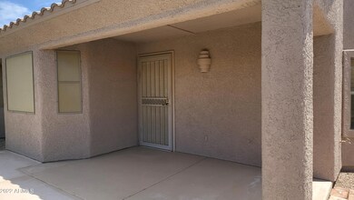 Back covered patio withn gas grill hook