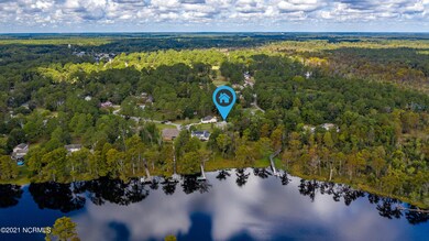 Aerial from River with Arrow