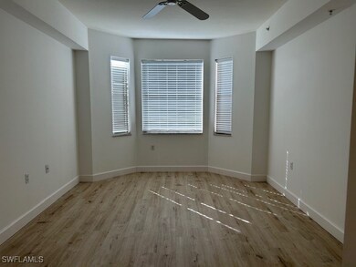 Empty room featuring light hardwood / wood-style f