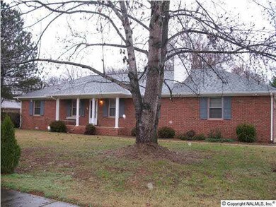 Front and back yard offer mature trees and leland cypress trees for screening.