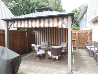 Ground level deck with four sided awning Pergola.