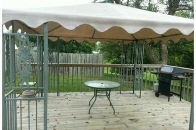 Patio/Deck. Patio door off the kitchen to this spa