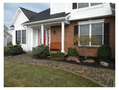 Exterior Front Beautifully landscaped with a Paver