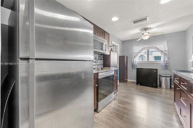 5716 NW 86th Ave, Tamarac, FL 33321 - photo 7