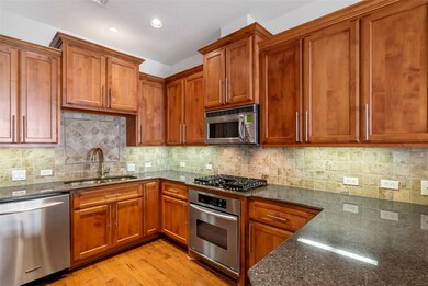 Light and bright kitchen with granite counters, st
