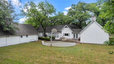 View of back of house and apartments