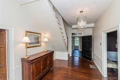 Wide, central hall with heart pine floors