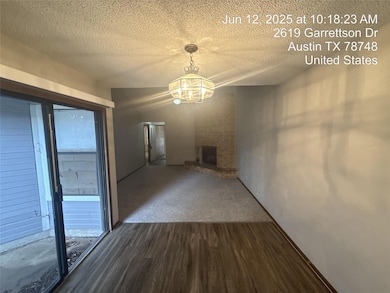 Unfurnished dining area featuring a chandelier, d