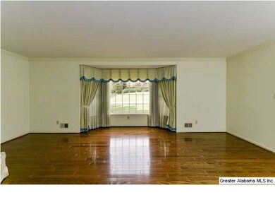 Formal living room with bay window