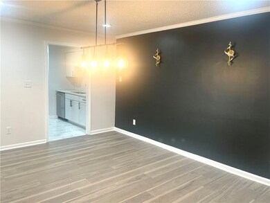 Unfurnished dining area with a textured ceiling, l