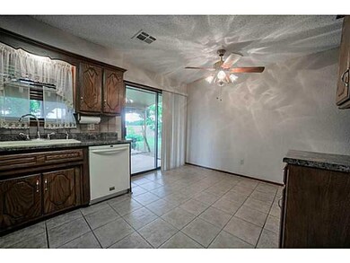 Dining Room. Dining space in kitchen opens to cove