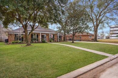 Beautiful mature shade trees surround the property
