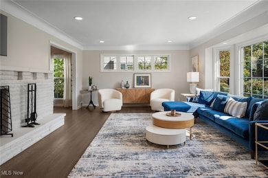 Oversized living room  is the first thing guests see when they walk in the front door. It includes a wood burning fireplace with gas starter for easy use.