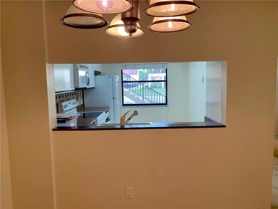The pass through into the kitchen.
