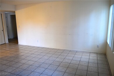 Empty room with tile patterned flooring