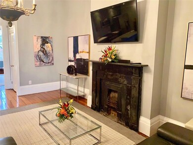 Historic fireplace elevates this space