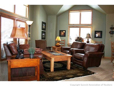 Living Room. Large bright living room with vaulted