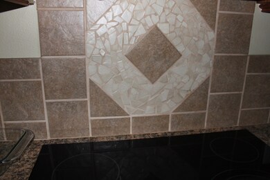 Decorative tile backsplash in Kitchen
