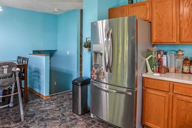 The kitchen opens to a large dinette.