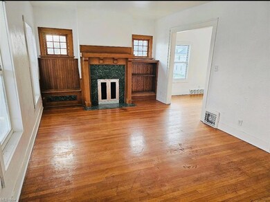 View of hardwood floored living room
