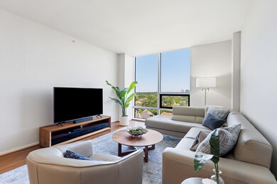 Floor to ceiling windows with automatic solar shad