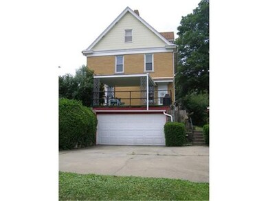 Exterior Back. Lots of off-street parking with the