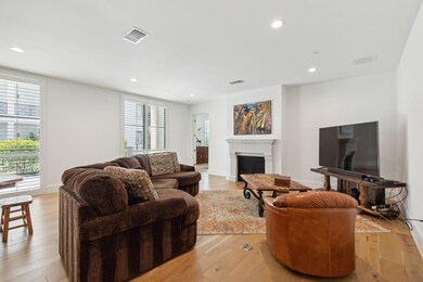 Living room featuring light hardwood / wood-style 