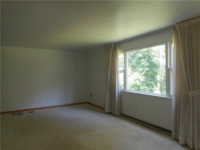 13 x 18 Living room with natural lighting