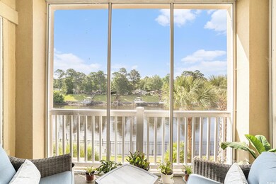 Sunroom with a water view