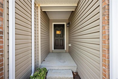 Covered entrance greets guests as they arrive