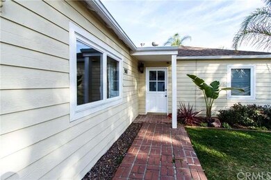 Walk-up to the charming cottage with dutch door.