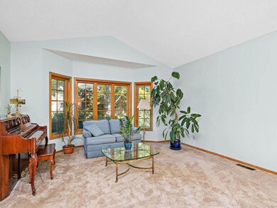 Sunken living room with vaulted ceiling