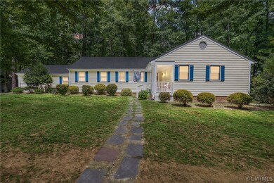 View of front of property with a front lawn