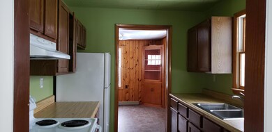 GALLEY KITCHEN WTH PLENTY OF CUPBOARDS