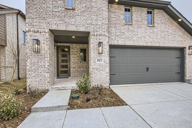 Property entrance with a garage